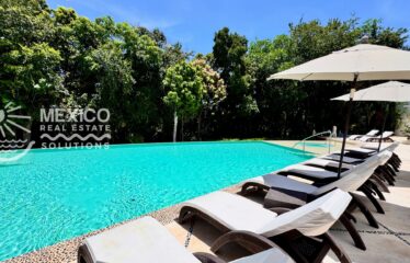 Ground Floor Golf Course Condo in Tulum Country Club Under $200K